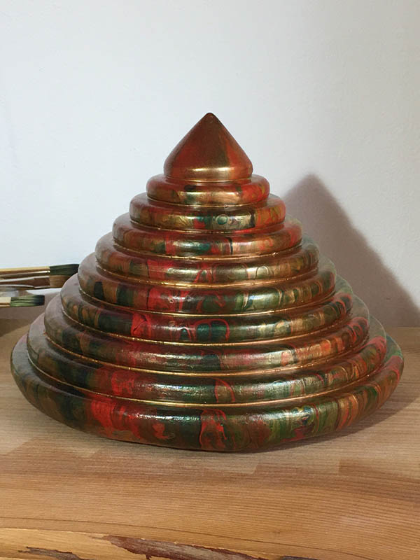 Pyramide pour équilibrer une maison